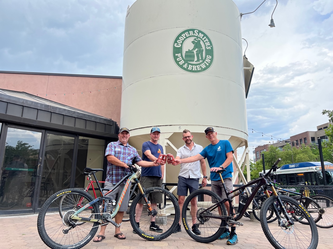 CooperSmith's raises beers and $809 for Overland Mountain Bike Association with Overland Trail Beer.