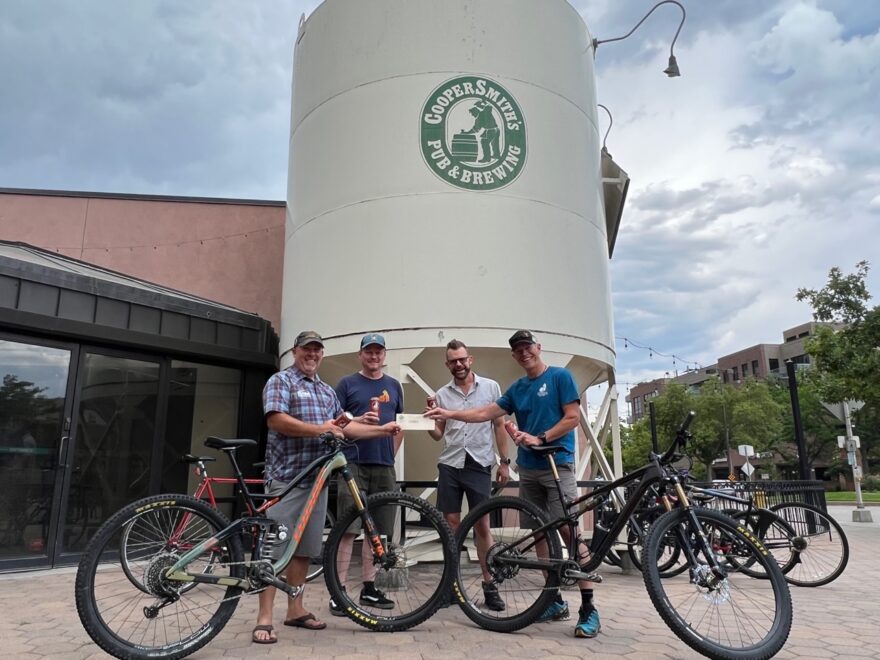 CooperSmith's raises beers and $809 for Overland Mountain Bike Association with Overland Trail Beer.
